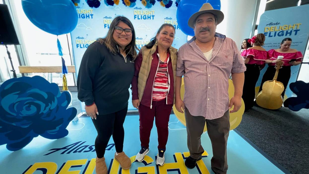 Rafael Hernandez (right) and the rest of his family at an event celebrating their all-expense paid trip to Mexico.