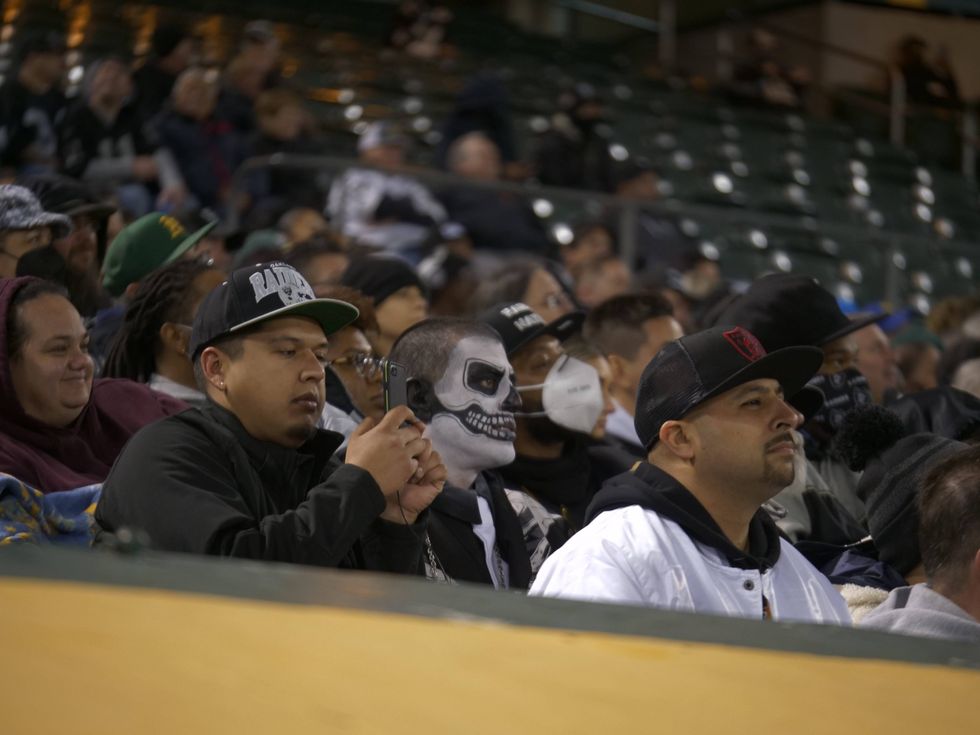 Raider fans watch from the stands during Monday night