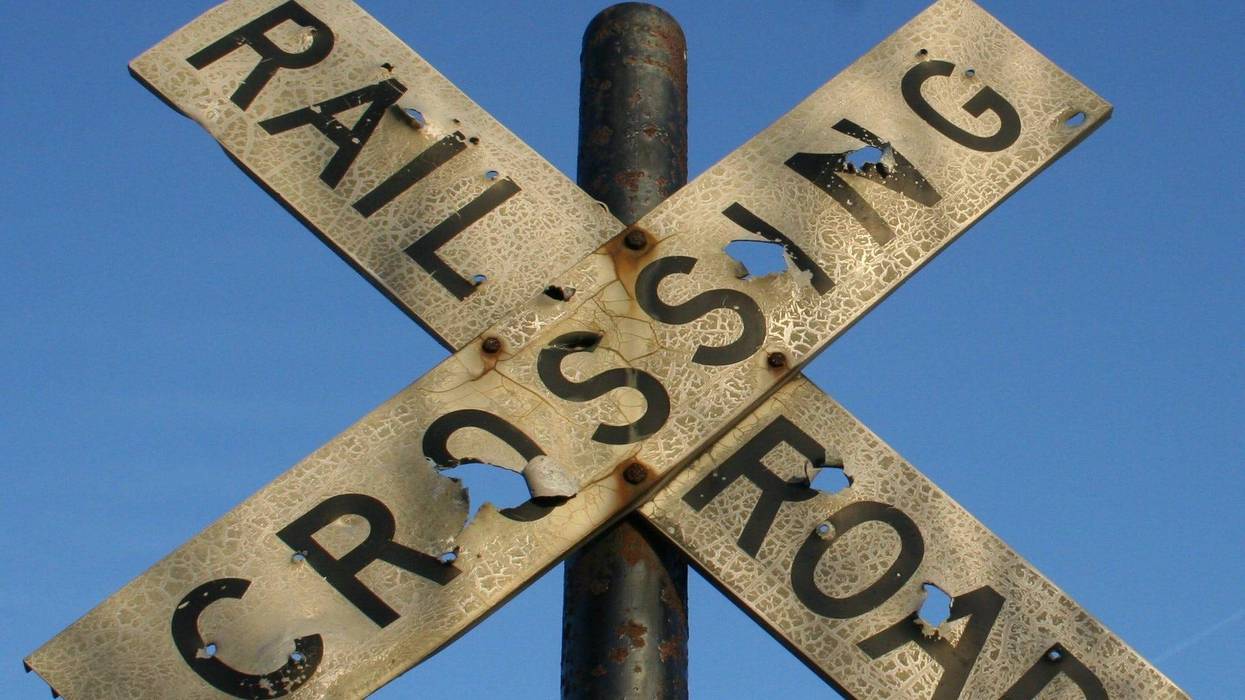 Railroad crossing - stock photo