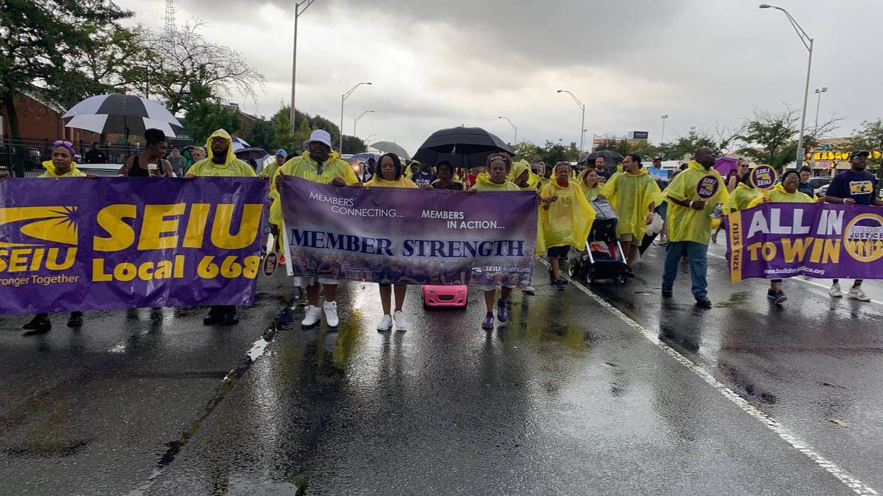 Rain dampens but does not stop the Philadelphia Labor Day parade.