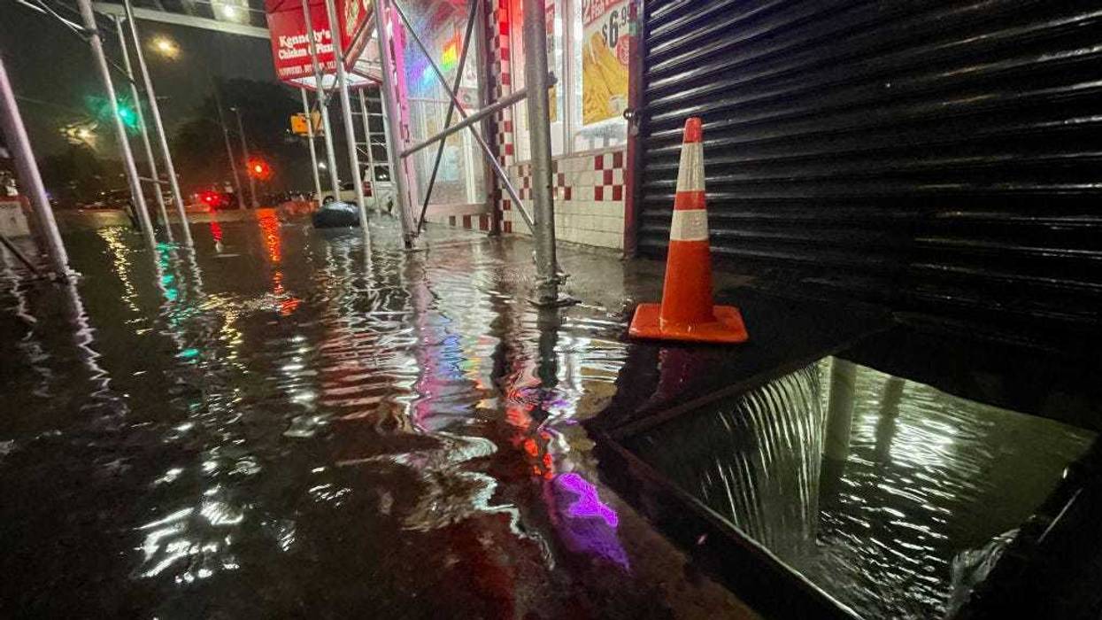Rainfall from Hurricane Ida flood the basement of a Kennedy Fried Chicken fast food restaurant on September 1, 2021, in the Bronx borough of New York City.