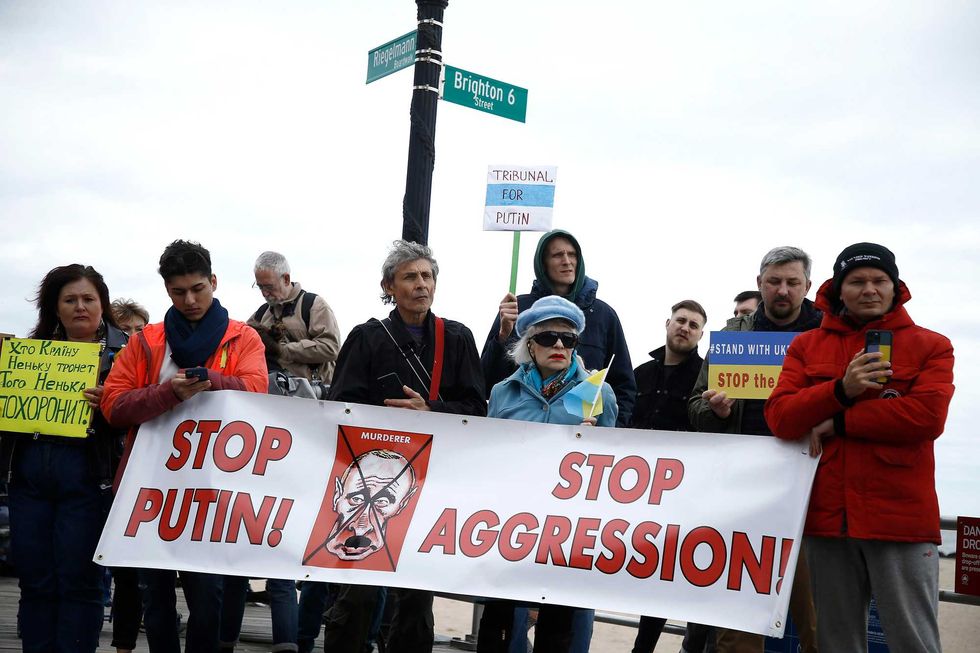 Rally participants listen to mostly Russian speakers denounce the war in the Ukraine on March 20, 2022 in the Brighton Beach section of the Brooklyn borough of New York City.