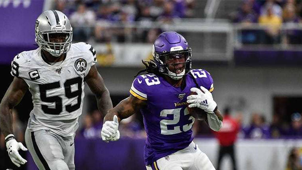 Rams wide receiver Brandin Cooks (12) is defended by Minnesota Vikings cornerback Trae Waynes on a 47-yard touchdown reception on Sept. 27, 2018, at Los Angeles Memorial Coliseum.