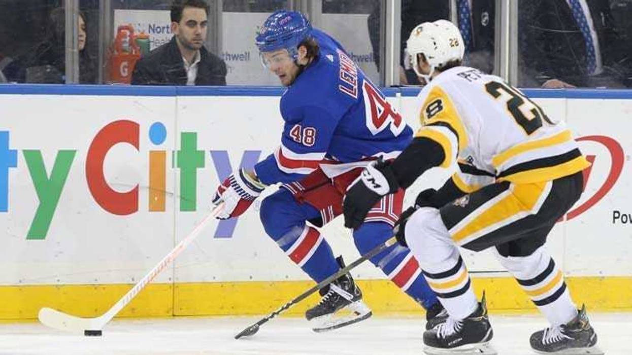 Rangers left wing Brendan Lemieux plays the puck against Penguins defenseman Marcus Pettersson on March 25, 2019, at Madison Square Garden.