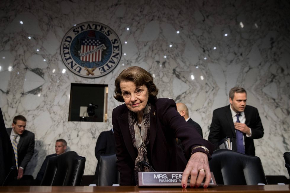 Ranking member Sen. Dianne Feinstein (D-CA) arrives for a Senate Judiciary Committee hearing concerning firearm accessory regulation and enforcing federal and state reporting to the National Instant Criminal Background Check System (NICS) on Capitol Hill, December 6, 2017 in Washington, DC.