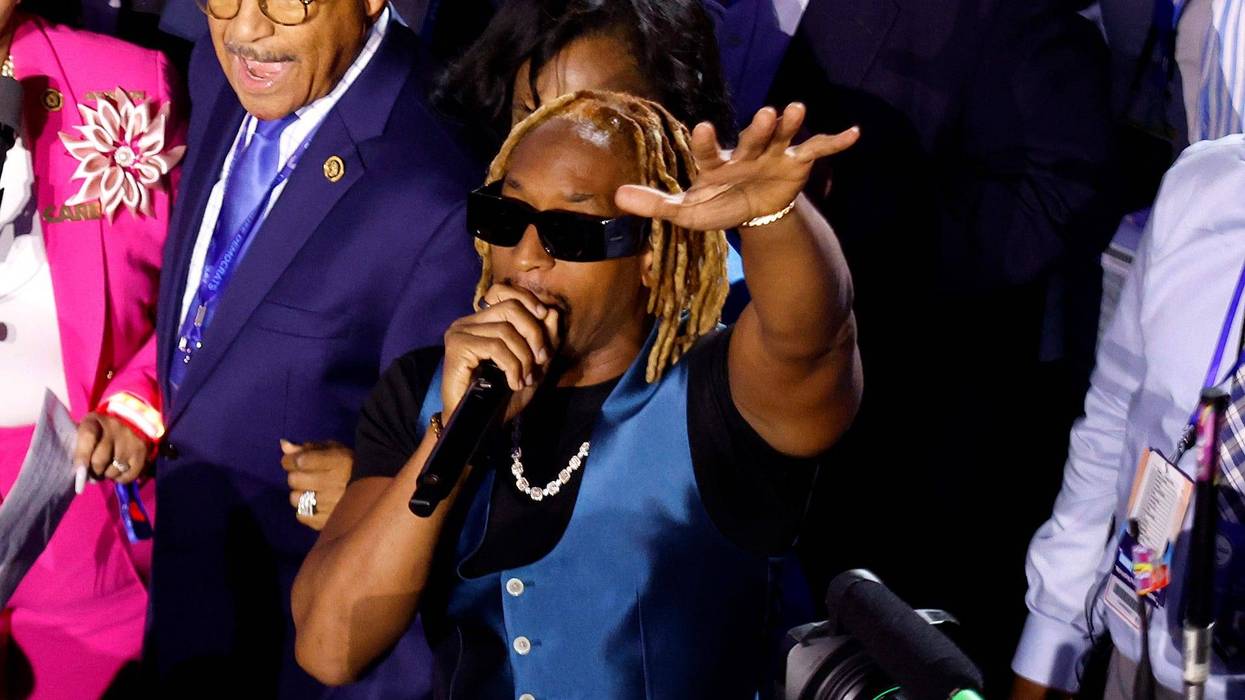 Rapper Lil Jon (R) performs with the Georgia delegation during the Ceremonial Roll Call of States on the second day of the Democratic National Convention at the United Center on August 20, 2024 in Chicago, Illinois. Delegates, politicians, and Democratic Party supporters are gathering in Chicago, as current Vice President Kamala Harris is named her party's presidential nominee. The DNC takes place from August 19-22.