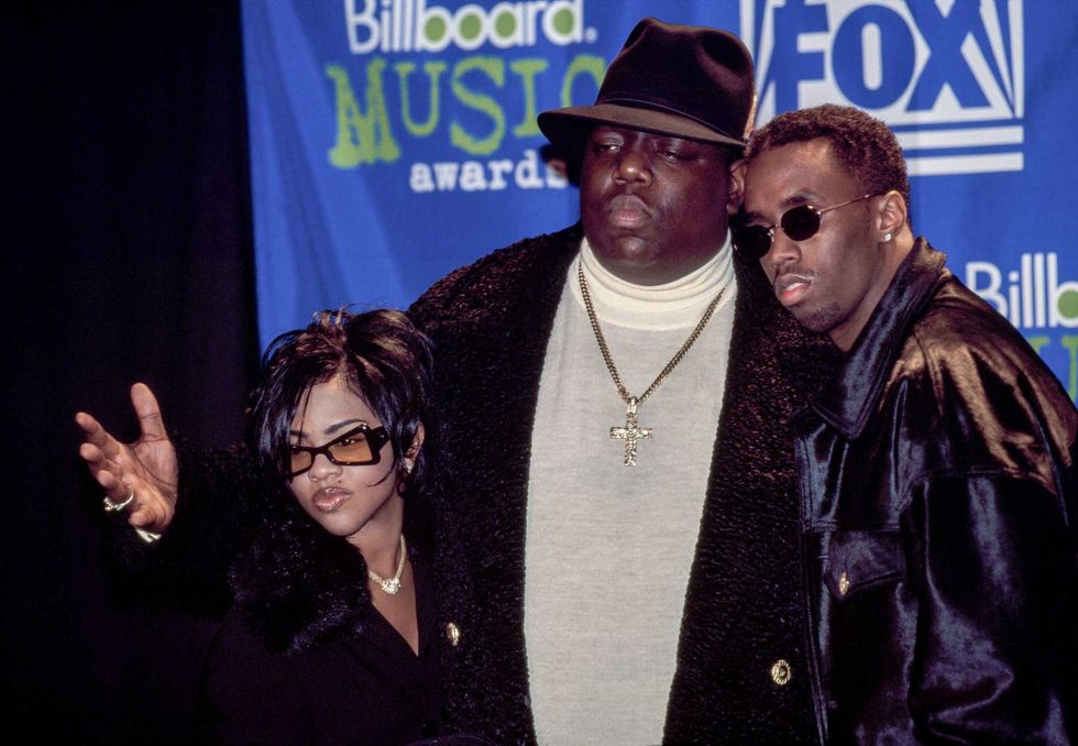 Rapper Notorious B.I.G. AKA Biggie Smalls (Christopher Wallace) joined by Sean (Puffy) Combs and Lil