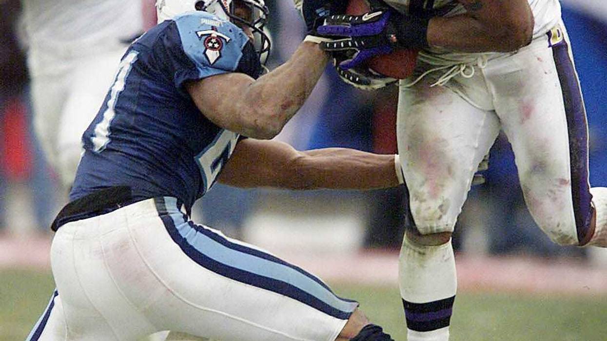 Ray Lewis takes the ball from Eddie George in the AFC Divisional game on January 7th, 2001
