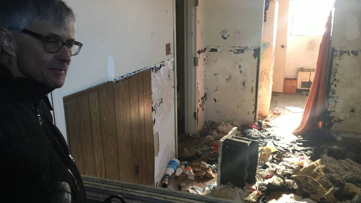 Ray Redlick of New Life Evangelistic Center inside abandoned north St. Louis church.