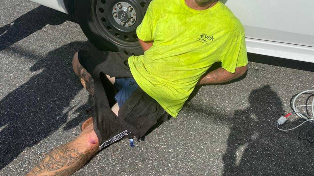 Raymond Hofmann in police custody after fleeing Brevard County Sheriff's deputies.