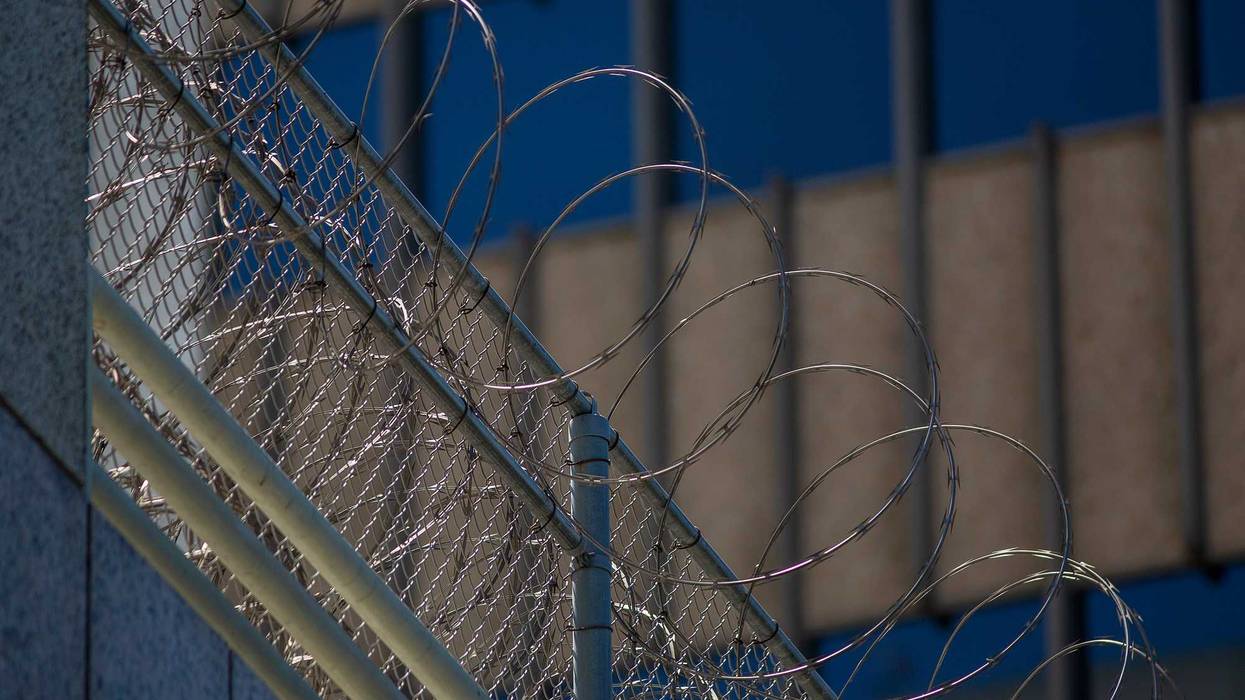 Razor wire is seen on the Metropolitan Detention Center prison as mass arrests by federal immigration authorities, as ordered by the Trump administration, were supposed to begin in major cities in 2019.