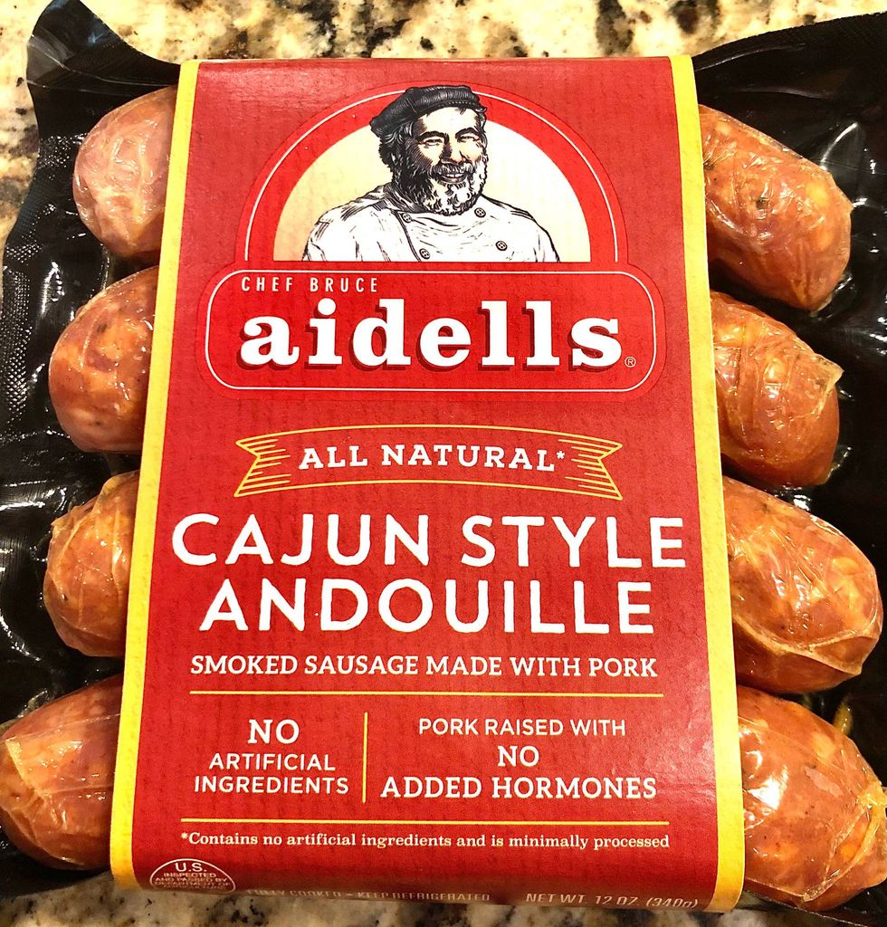 Recipe: Shrimp & Smoked Cheddar Grits with Tasso Gravy and Andouille Sausage