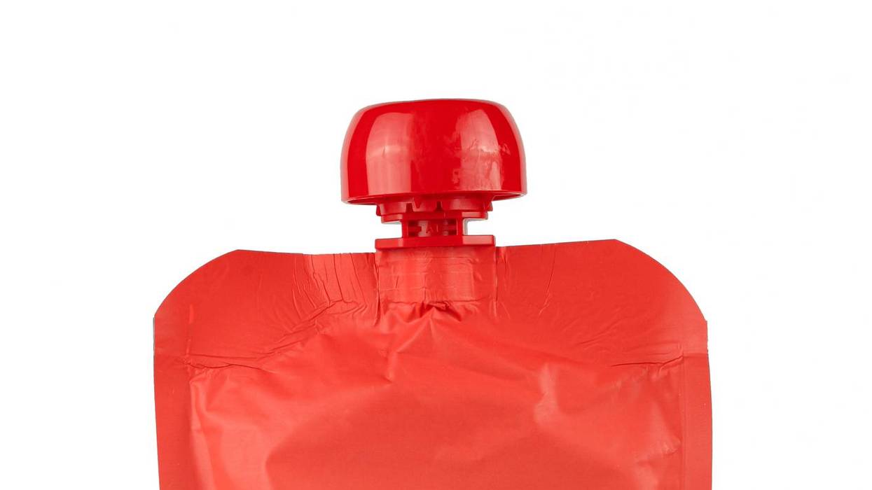 Red puree drink pouch bag mockup isolated on white background