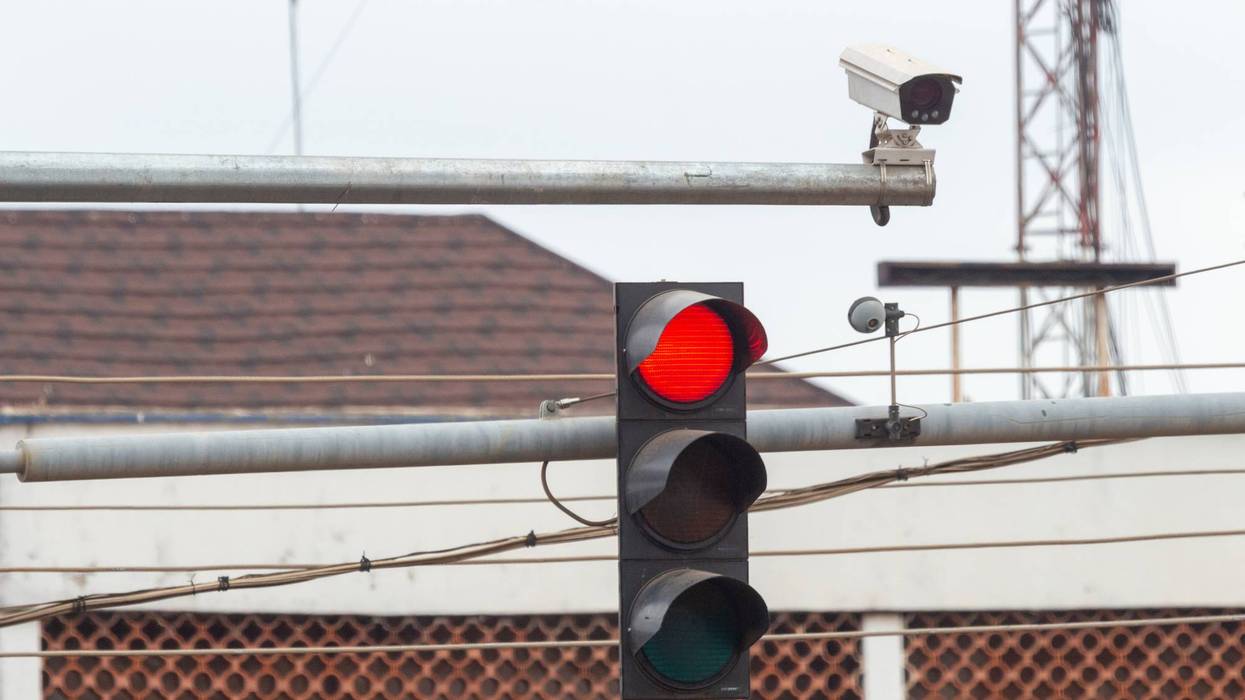Red Traffic Light with Urban Traffic Surveillance