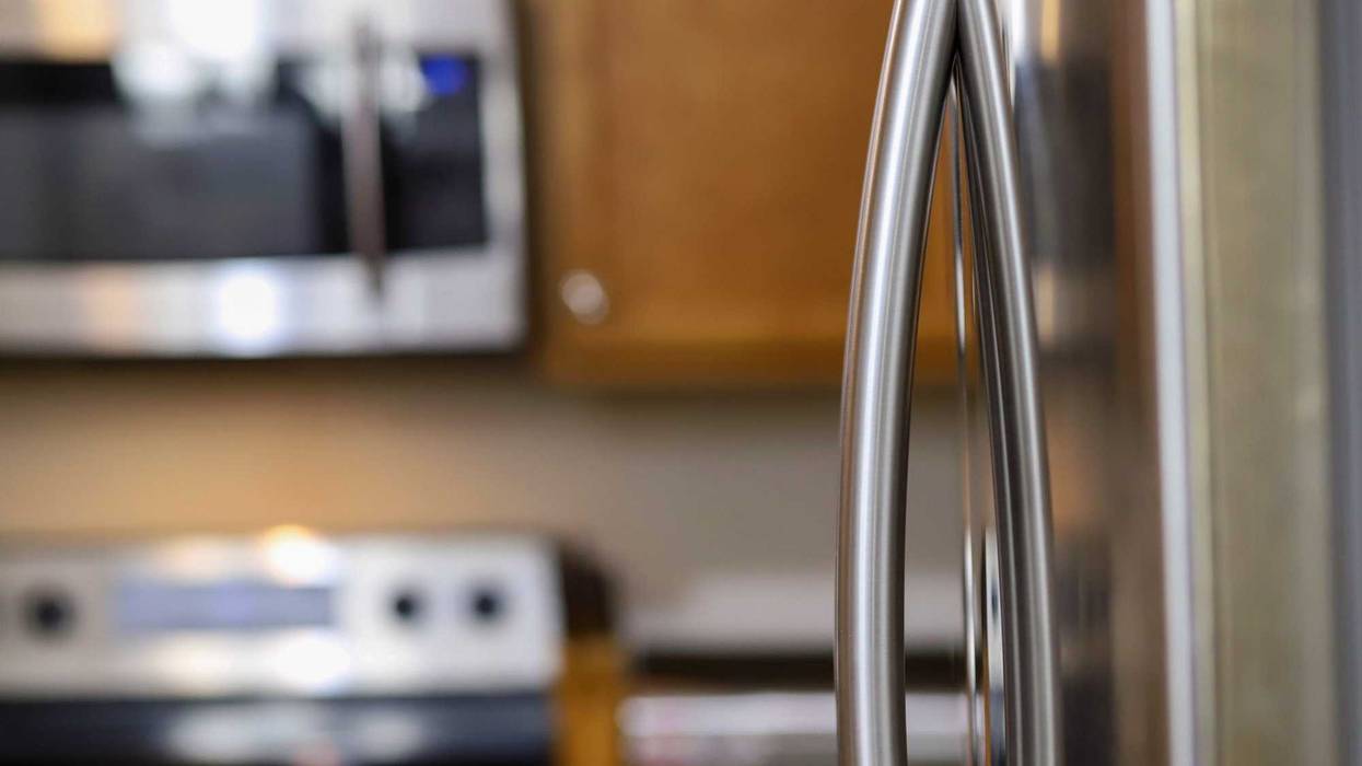 Refrigerator with French doors stock photo.