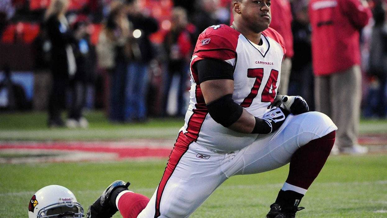 Reggie Wells Junior stretching for Cardinals