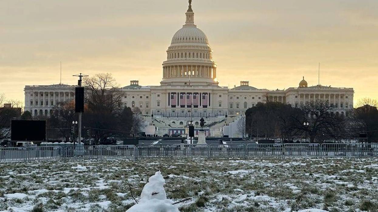 Remnants of a small snowman stand on the National Mall in front of the U.S. Capitol in the days ahead of President-elect Donald Trump's second-term inauguration. The ceremony on Jan. 20 will be moved to the rotunda of the U.S. Capitol as temperatures are expected to be the lowest in 40 years.