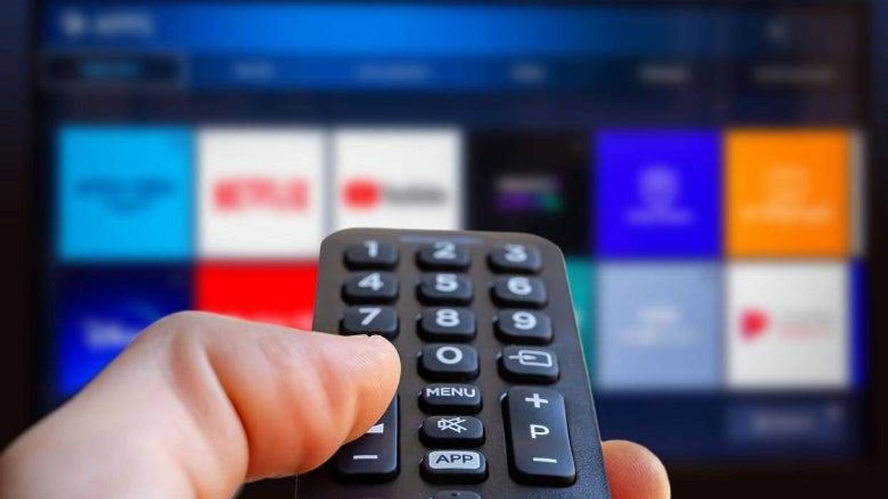 remote control in front of TV