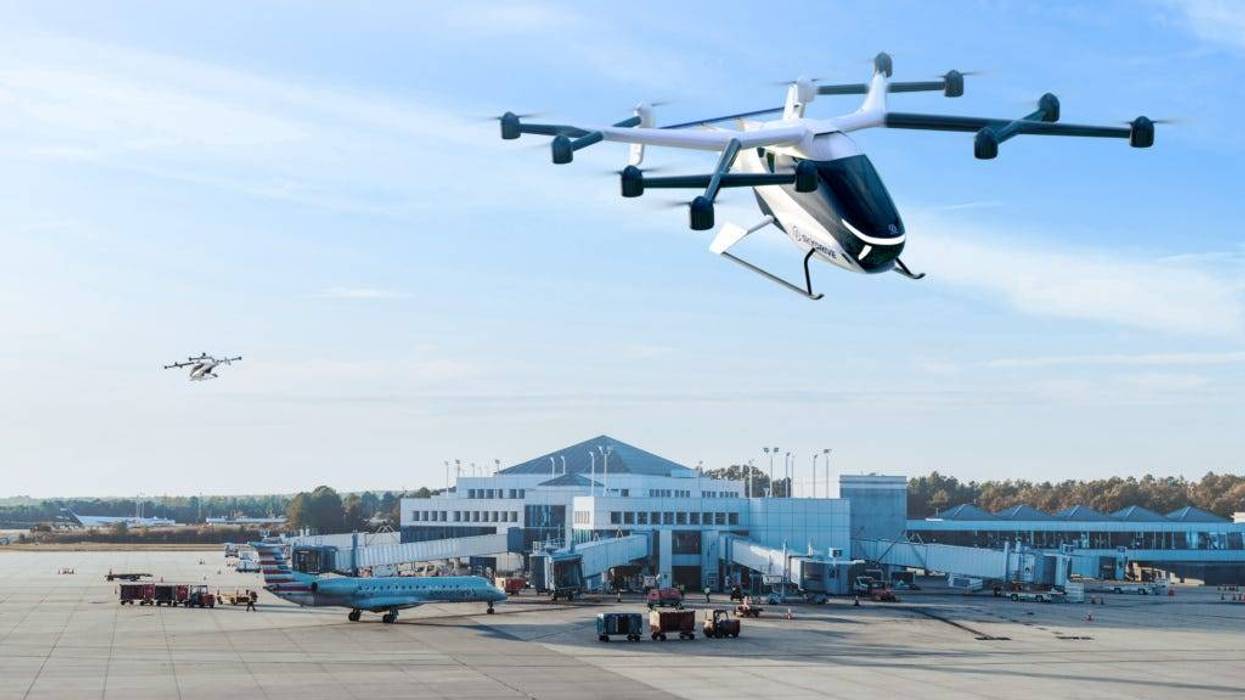 Render of a SkyDrive eVTOL aircraft flying over the Columbia Metropolitan Airport