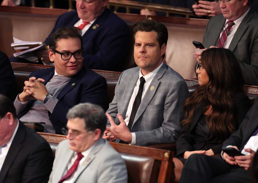 Rep.-elect Matt Gaetz (R-FL), and Rep.-elect Lauren Boebert (R-CA) sit together in the House Chamber during the fourth day of elections for Speaker of the House at the U.S. Capitol Building on January 07, 2023 in Washington, DC.