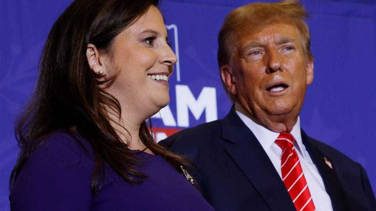 Rep. Elise Stefanik (R-NY) (L) joins Republican presidential candidate and former President Donald Trump during a campaign rally at the Grappone Convention Center on January 19, 2024 in Concord, New Hampshire.
