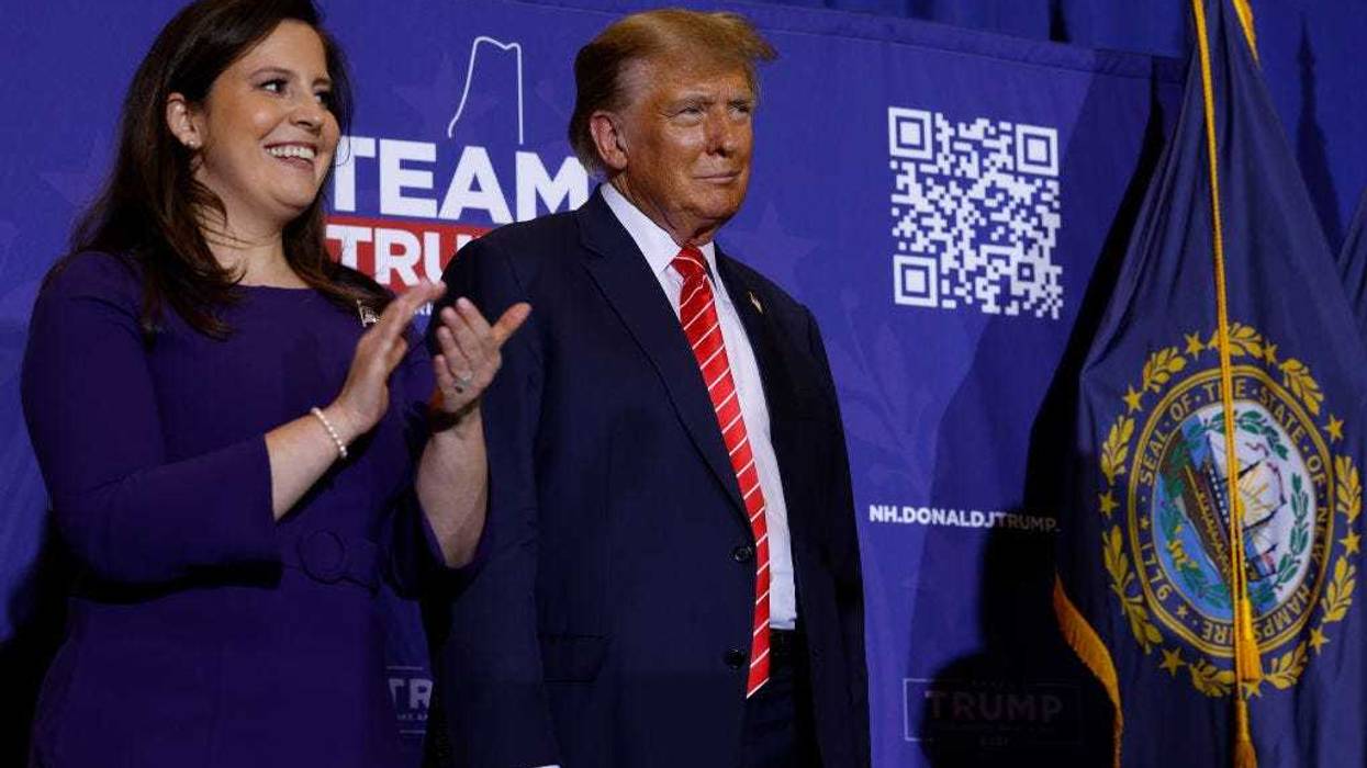 Rep. Elise Stefanik (R-NY) (L) joins Republican presidential candidate and former President Donald Trump during a campaign rally at the Grappone Convention Center on January 19, 2024 in Concord, New Hampshire.