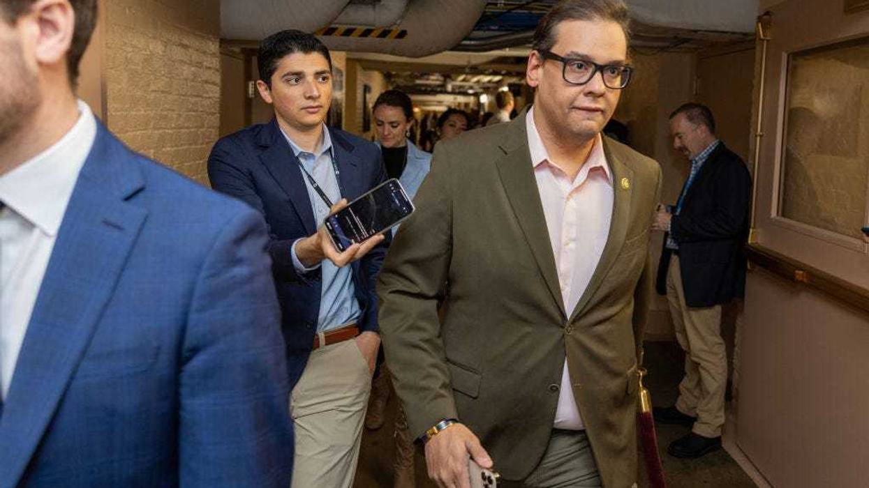 Rep. George Santos (R-NY) is followed by members of the media as he walks in the U.S. Capitol on April 26, 2023 in Washington, DC. Speaker McCarthy said they would vote on Wednesday, on a bill to raise the $31.4 trillion federal debt ceiling.
