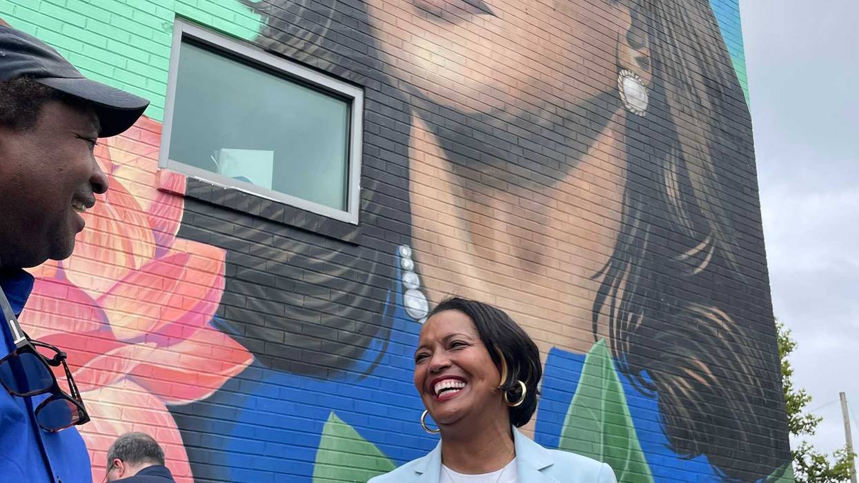 Rep. Jahana Hayes (D-CT5) greets a supporter near a mural depicting Vice President Kamala Harris at a state Democrats' news conference supporting Harris and VP nominee Tim Walz in Hartford, 8/6/24