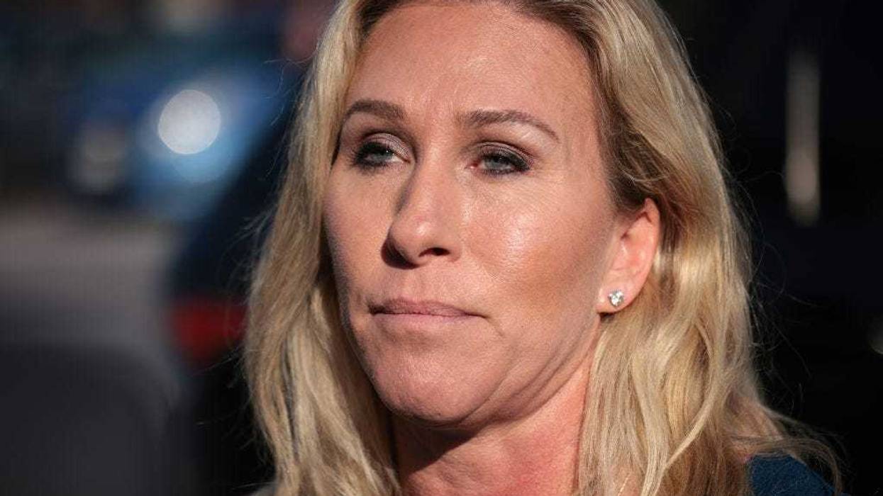 Rep. Marjorie Taylor Greene (R-GA) answers questions in front of the House steps while House Minority Leader Kevin McCarthy holds a press conference November 17, 2021 in Washington, DC.