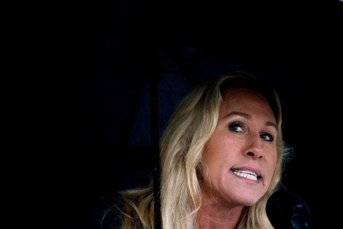 Rep. Marjorie Taylor Greene (R-GA) speaks a news conference in the rain outside of the U.S. Capitol on March 17, 2022 in Washington, DC.