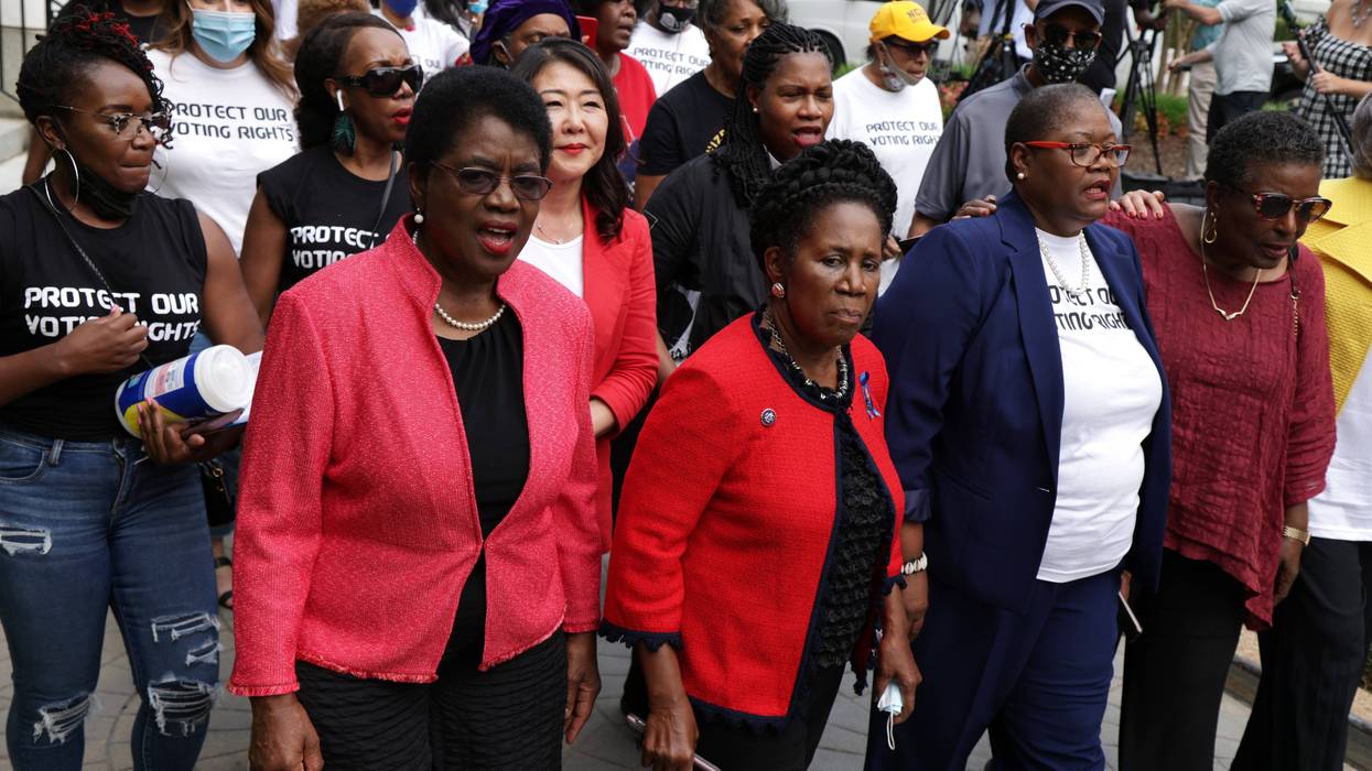 Rep. Sheila Jackson Lee with voting rights activists in a protest on Capitol Hill.
