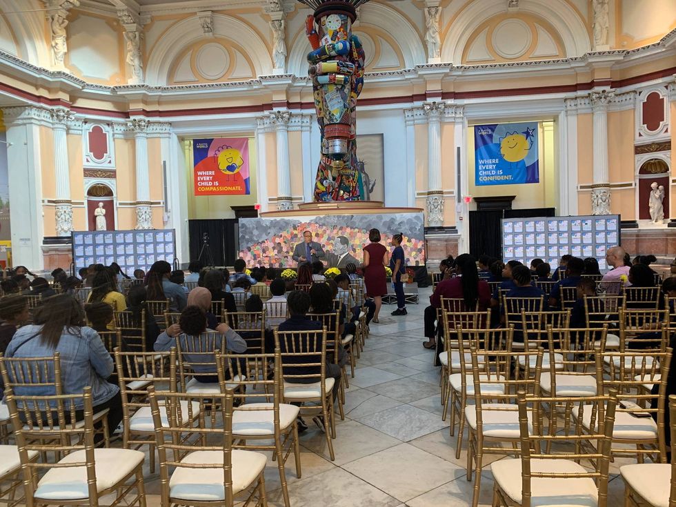 Republican David Oh addresses a room full of grade-schoolers at the Please Touch Museum.