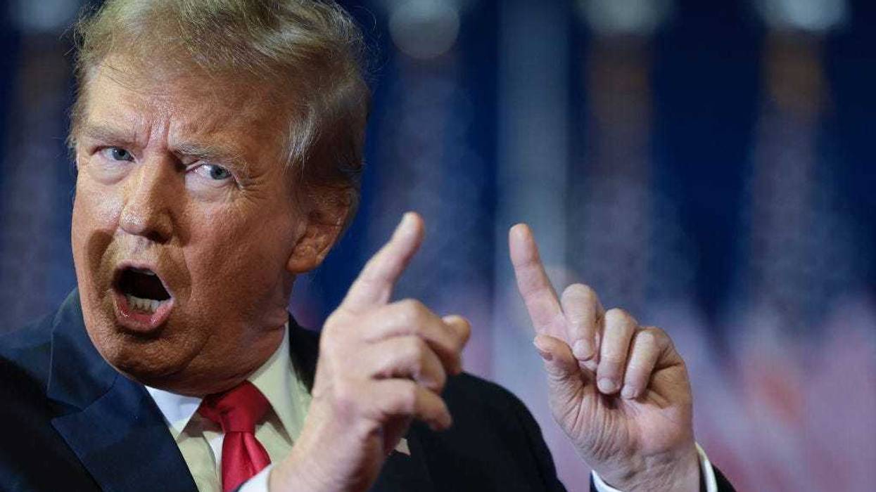 Republican presidential candidate and former President Donald Trump mocks U.S. President Joe Biden while speaking during a Get Out The Vote rally at Coastal Carolina University on February 10, 2024 in Conway, South Carolina. South Carolina holds its Republican primary on February 24.