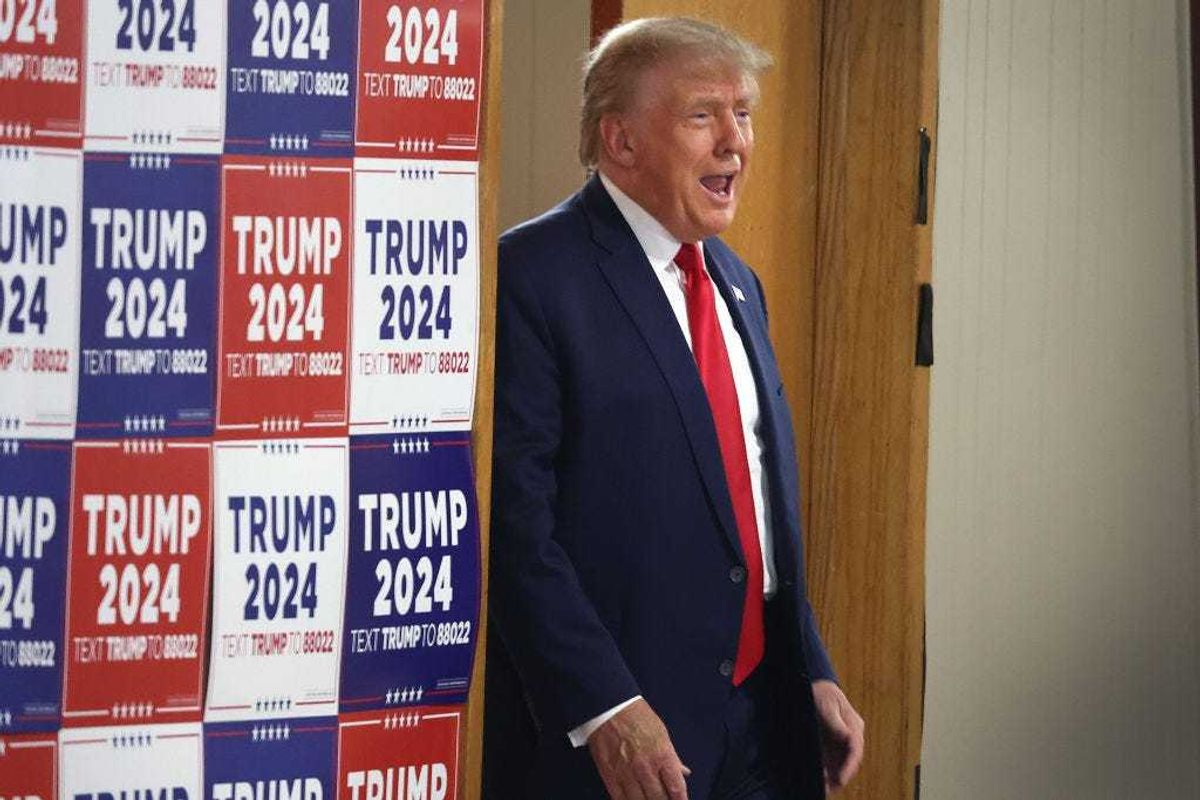 Republican presidential candidate and former U.S. President Donald Trump arrives for a "Commit To Caucus" rally at the Jackson County Fairgrounds on September 20, 2023 in Maquoketa, Iowa. The event is the first of two Trump has scheduled in Iowa today. (Photo by Scott Olson/Getty Images)