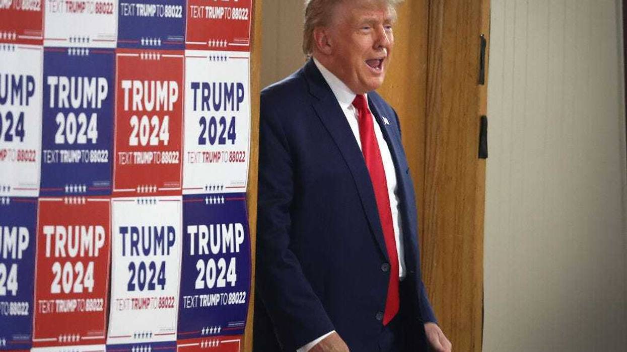 Republican presidential candidate and former U.S. President Donald Trump arrives for a "Commit To Caucus" rally at the Jackson County Fairgrounds on September 20, 2023 in Maquoketa, Iowa. The event is the first of two Trump has scheduled in Iowa today. (Photo by Scott Olson/Getty Images)