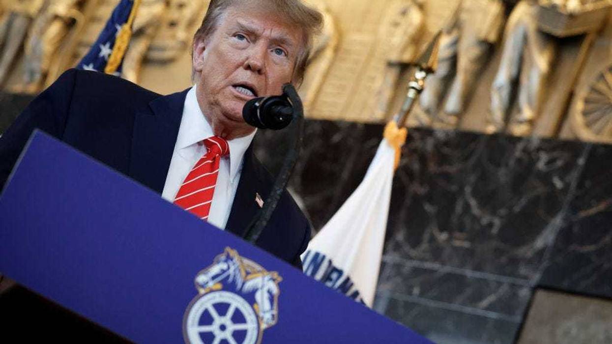 Republican presidential candidate and former U.S. President Donald Trump delivers remarks after meeting with leaders of the International Brotherhood of Teamsters at their headquarters on January 31, 2024 in Washington, DC. The United Auto Workers endorsed President Joe Biden's re-election campaign one week ago. (Photo by Chip Somodevilla/Getty Images)