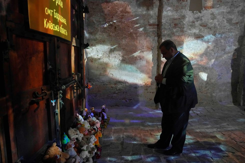 Republican presidential candidate former New Jersey Gov. Chris Christie pays tribute to Ukrainian children killed during Ukrainian-Russian war in the National Museum of the History of Ukraine in the Second World War, Kyiv, Ukraine, Friday, Aug. 4, 2023