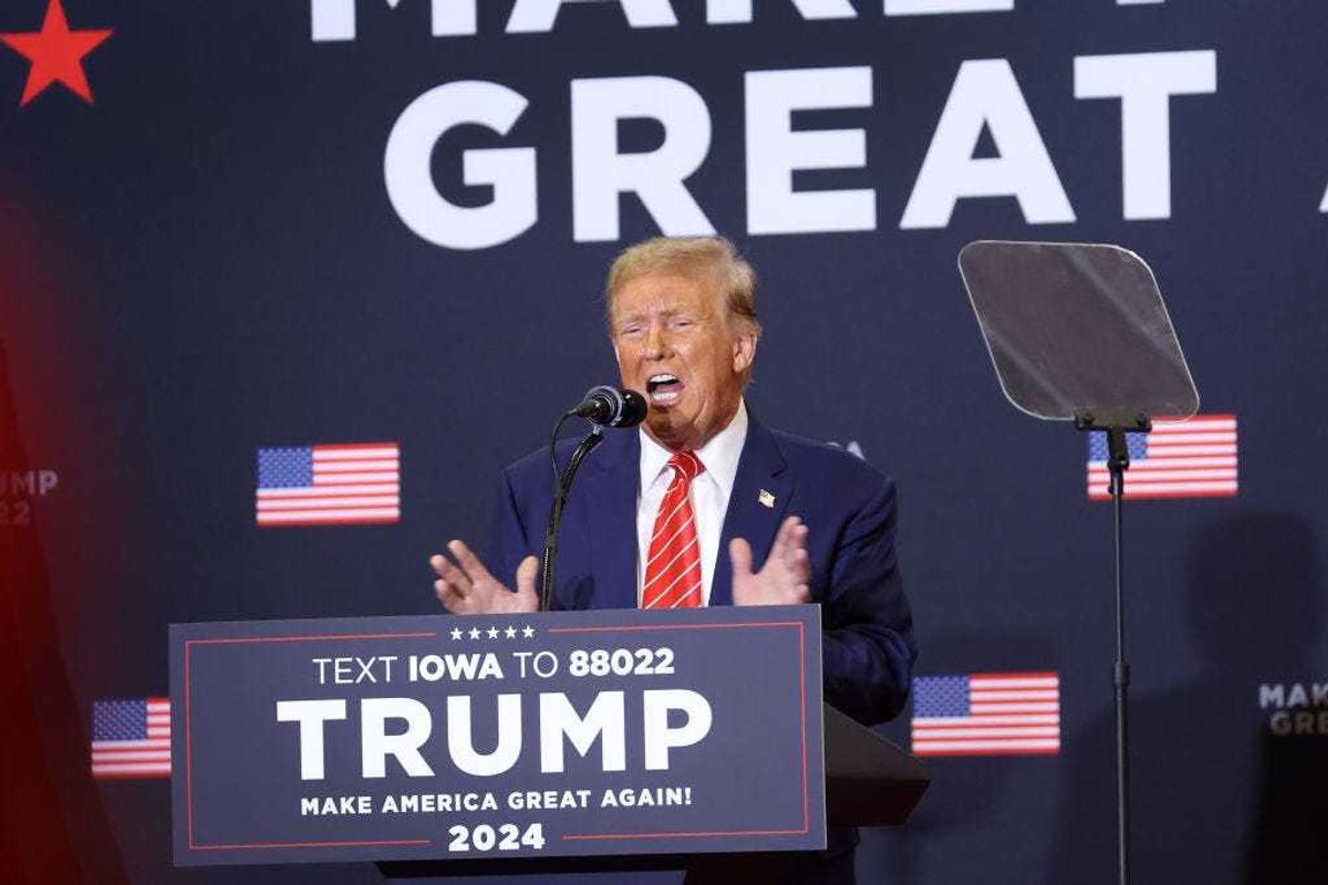 Republican presidential candidate former President Donald Trump speaks to guests during a rally at Clinton Middle School on January 06, 2024 in Clinton, Iowa.