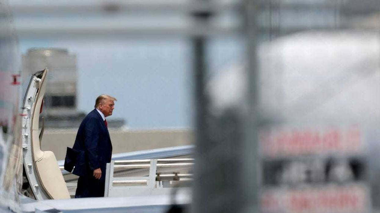 Republican presidential candidate former U.S. President Donald Trump arrives at the Miami International Airport June 12, 2023 in Miami, Florida.