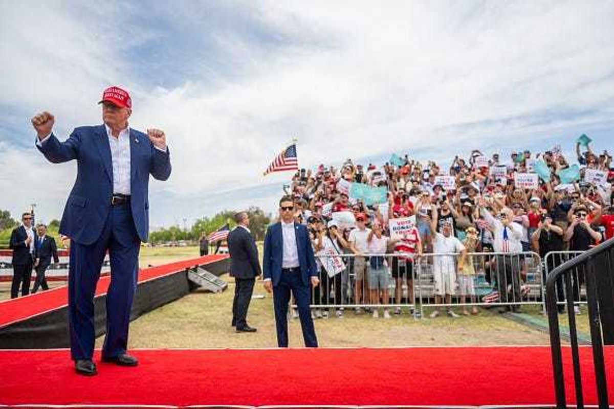 Republican presidential candidate, former U.S. President Donald Trump dances upon arrival at his campaign rally at Sunset Park on June 09, 2024 in Las Vegas, Nevada.