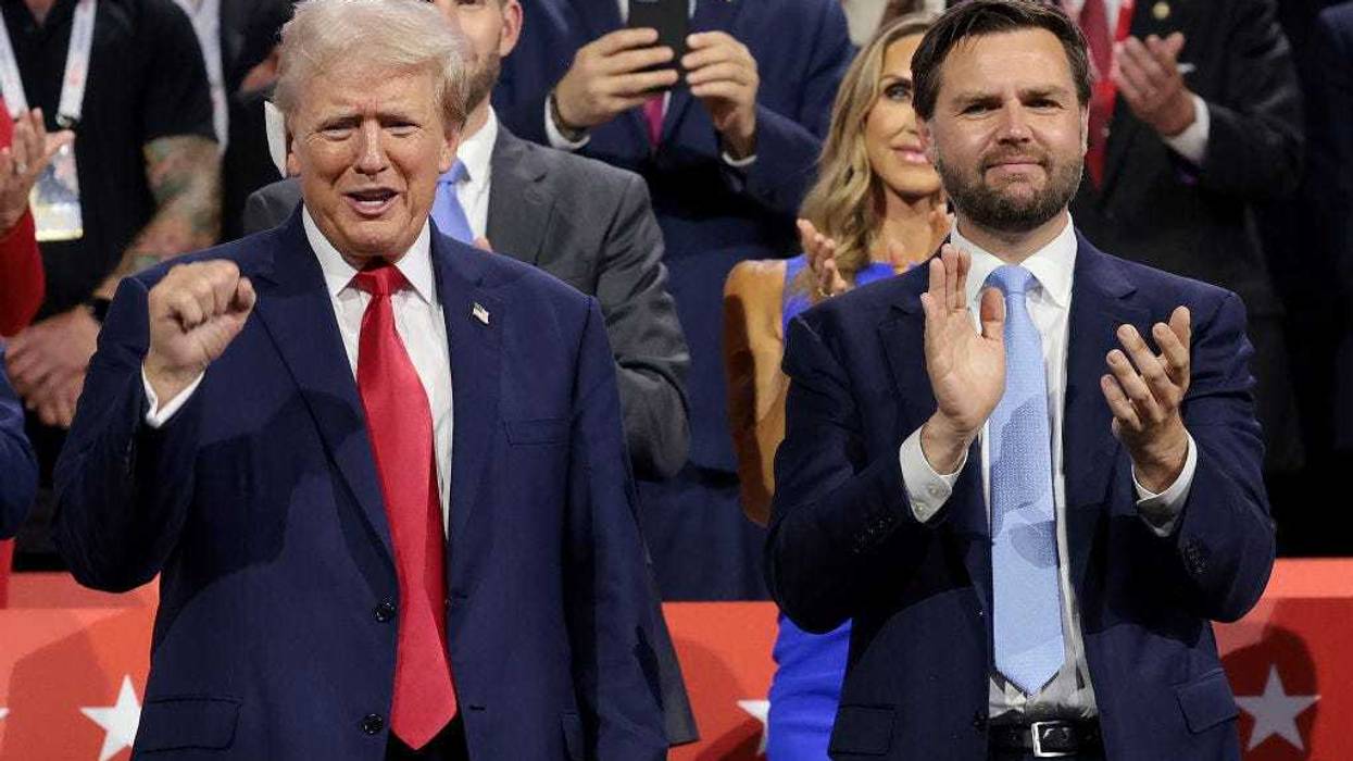 Republican presidential candidate, former U.S. President Donald Trump (L) and Republican vice presidential candidate, U.S. Sen. J.D. Vance (R-OH) appear on the first day of the Republican National Convention at the Fiserv Forum on July 15, 2024 in Milwaukee, Wisconsin.