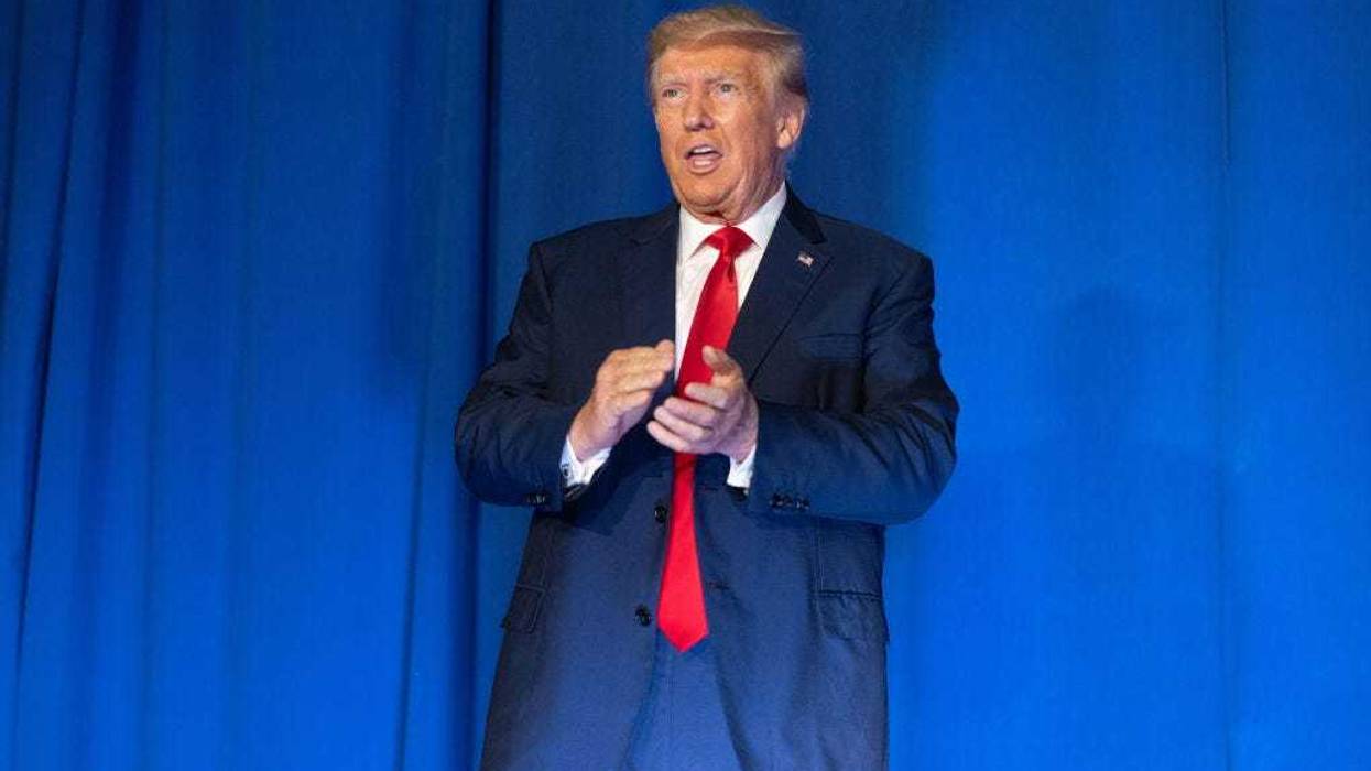 Republican presidential candidate, former U.S. President Donald Trump stands on stage after being introduced during the New Hampshire Federation of Republican Women's Lilac Luncheon on June 27, 2023 in Concord, New Hampshire.
