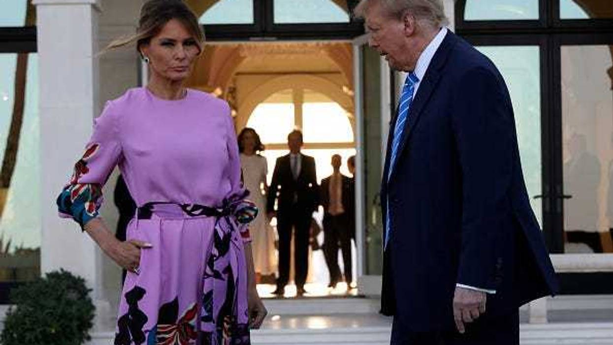 Republican presidential candidate, former US President Donald Trump and former first lady Melania Trump arrive at the home of billionaire investor John Paulson on April 6, 2024 in Palm Beach, Florida.