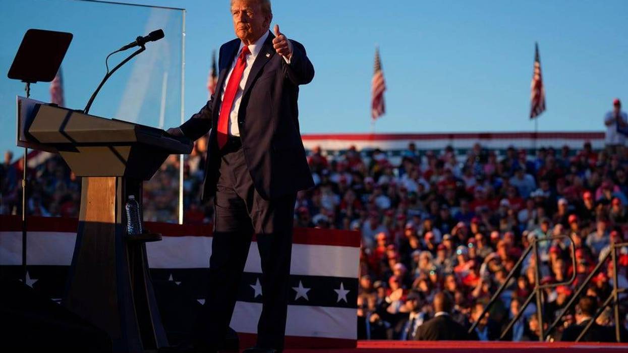 Republican presidential nominee former President Donald Trump gestures at a campaign rally at the Butler Farm Show, Saturday, Oct. 5, 2024, in Butler, Pa.