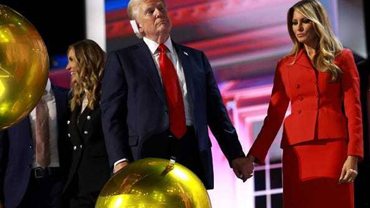 Republican presidential nominee, former U.S. President Donald Trump and Former first lady Melania Trump on stage and the conclusion of the fourth day of the Republican National Convention at the Fiserv Forum on July 18, 2024 in Milwaukee, Wisconsin.