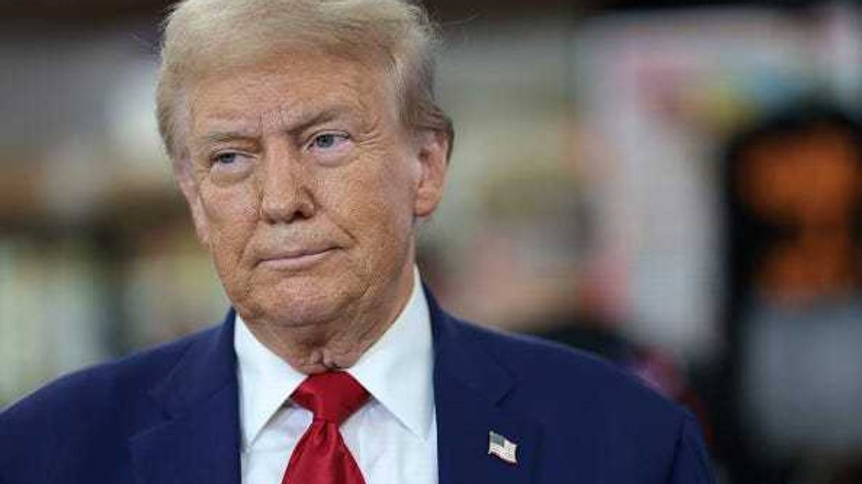 Republican presidential nominee, former U.S. President Donald Trump, looks on as he visits Sprankle's Neighborhood Market on September 23, 2024 in Kittanning, Pennsylvania.