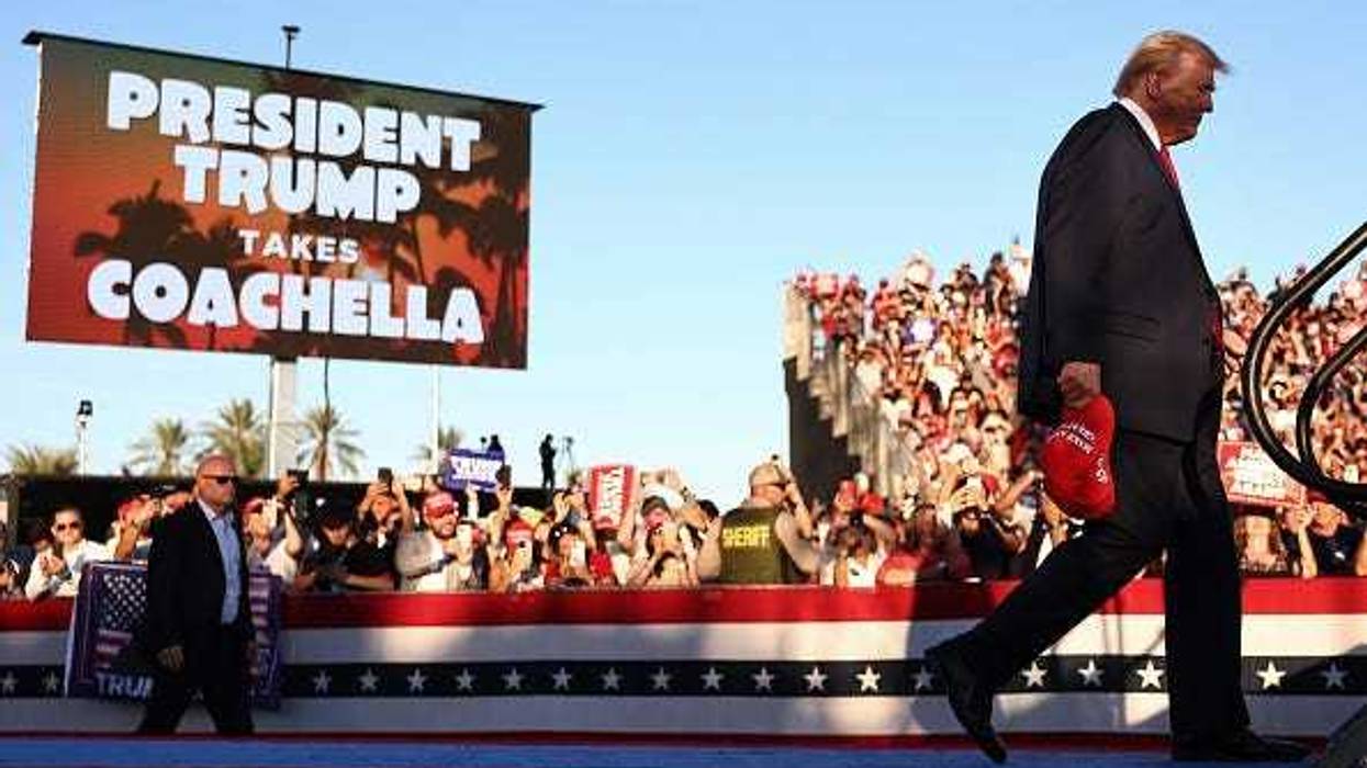 Republican presidential nominee, former U.S. President Donald Trump walks onstage for a campaign rally on October 12, 2024 in Coachella, California.