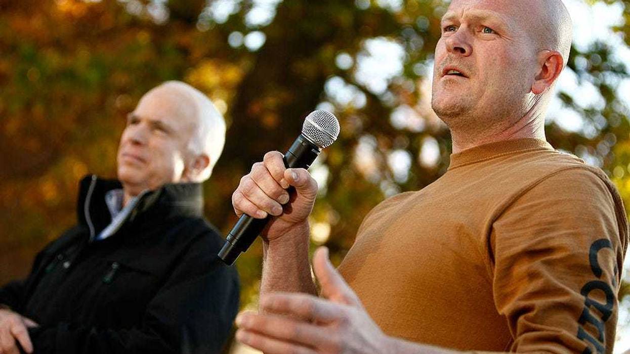 Republican presidential nominee Sen. John McCain (R-AZ) (L) and Samuel "Joe the Plumber" Wurzelbacher address a campaign rally at Lorain County Community College October 30, 2008 in Elyria, Ohio.