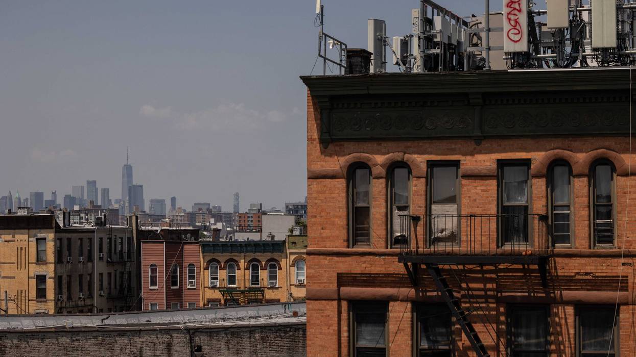 Residential apartment buildings in front of the Manhattan skyline in Queens