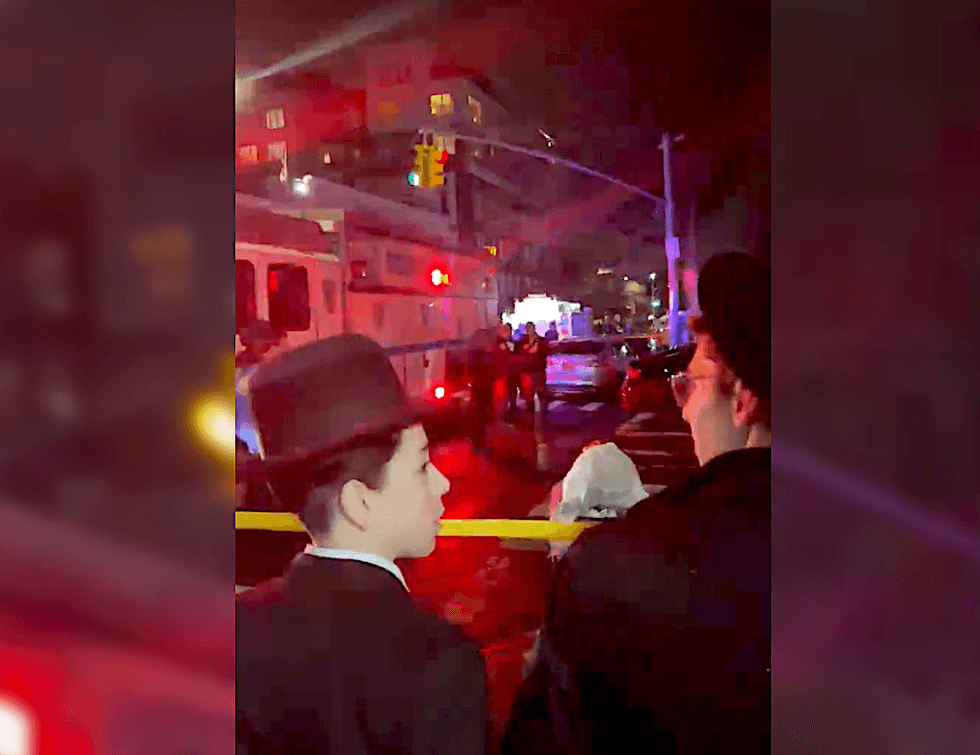 Residents gathered near the scene as police investigated